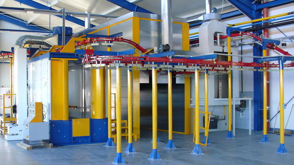 Photo of a compact EUROIMPIANTI powder coating line