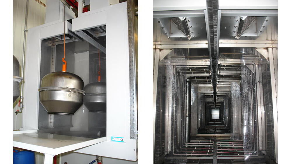 Photo of the pretreatment spray tunnel — the first stage of powder coating