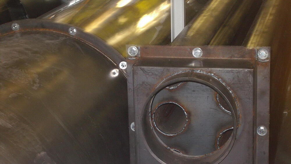 In the photo exhaust chimneys of the curing oven heat exchanger